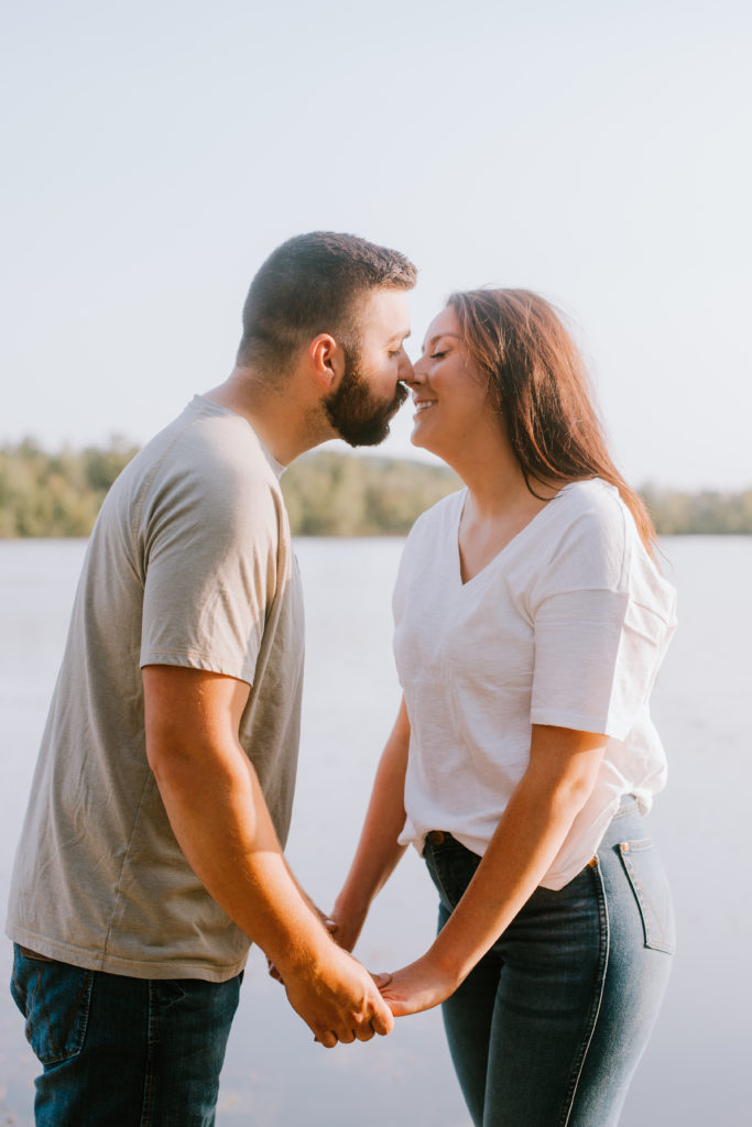 Couple mid-kiss at their Jorgens Park engagement session.