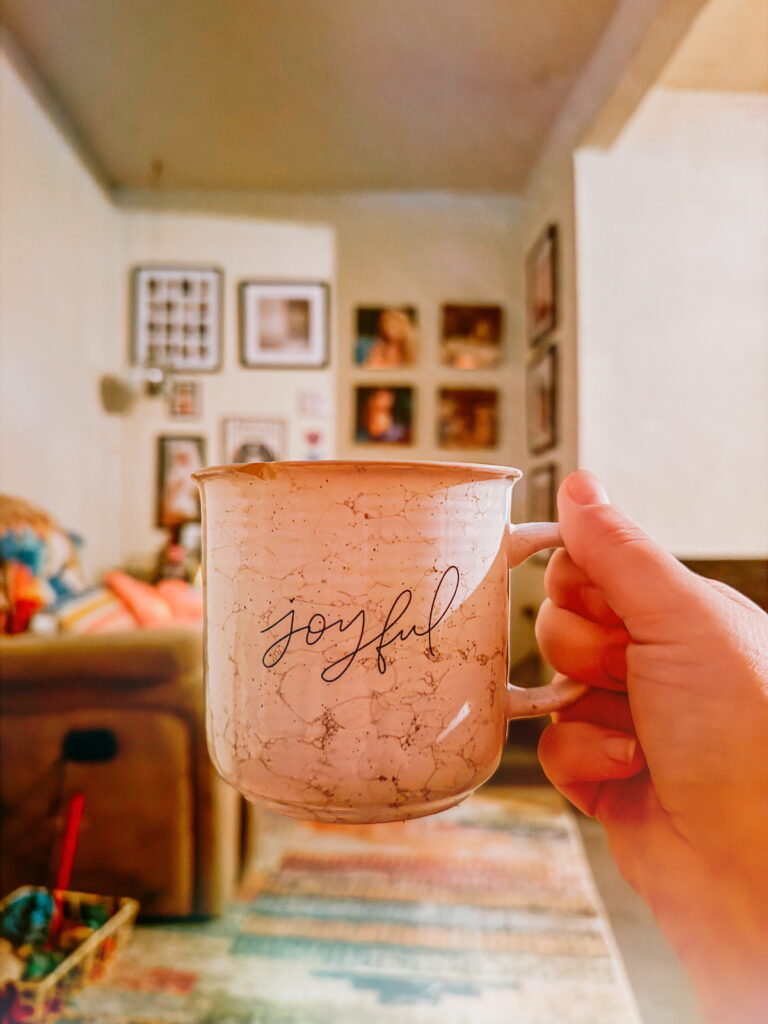 Currently: drinking coffee out of my "joyful" mug sitting in my living room.