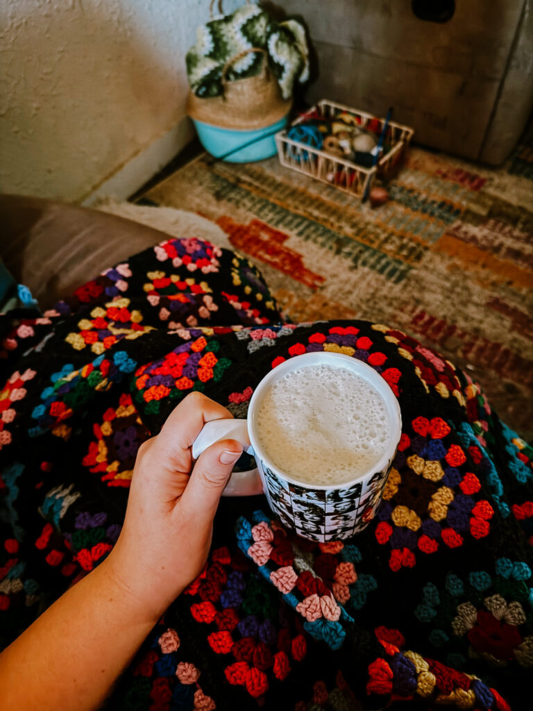 Currently: drinking coffee under my favorite couch blanket, using my mug from Taylor Swift's The Eras Tour